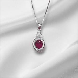 Oval Ruby Bezel and Diamond Accent Pendant