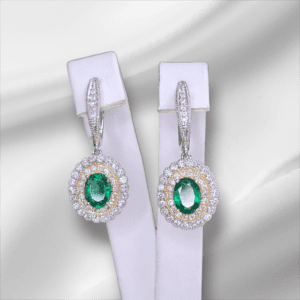 Two Tone Oval Emerald Dangle Earrings with Double Halo